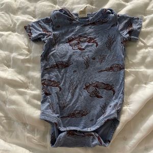 Kate quinn otter body suit
